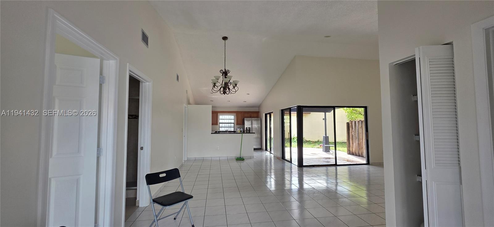 15238 Southwest 58th Terrace Miami, FL 33193 - Photo 17 of 46 a view of a room with large windows and stairs