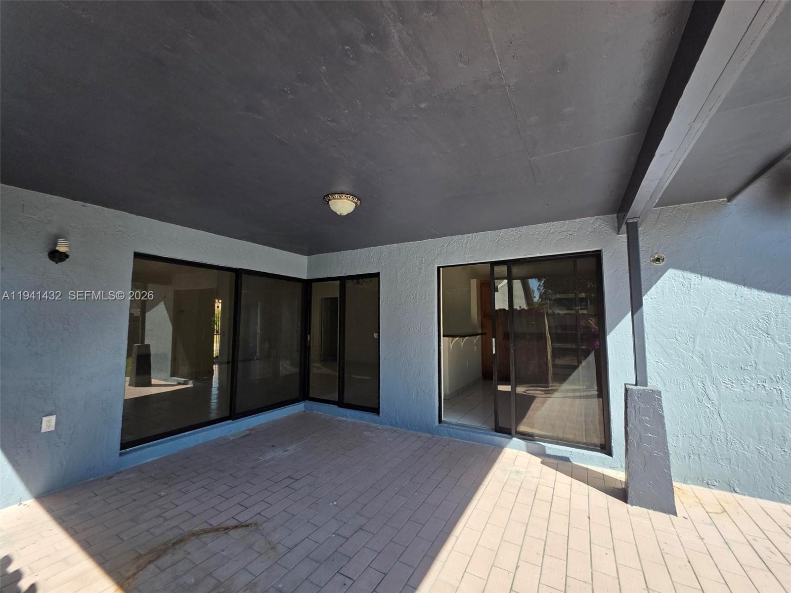 15238 Southwest 58th Terrace Miami, FL 33193 - Photo 27 of 38 workspace with wooden floor and windows