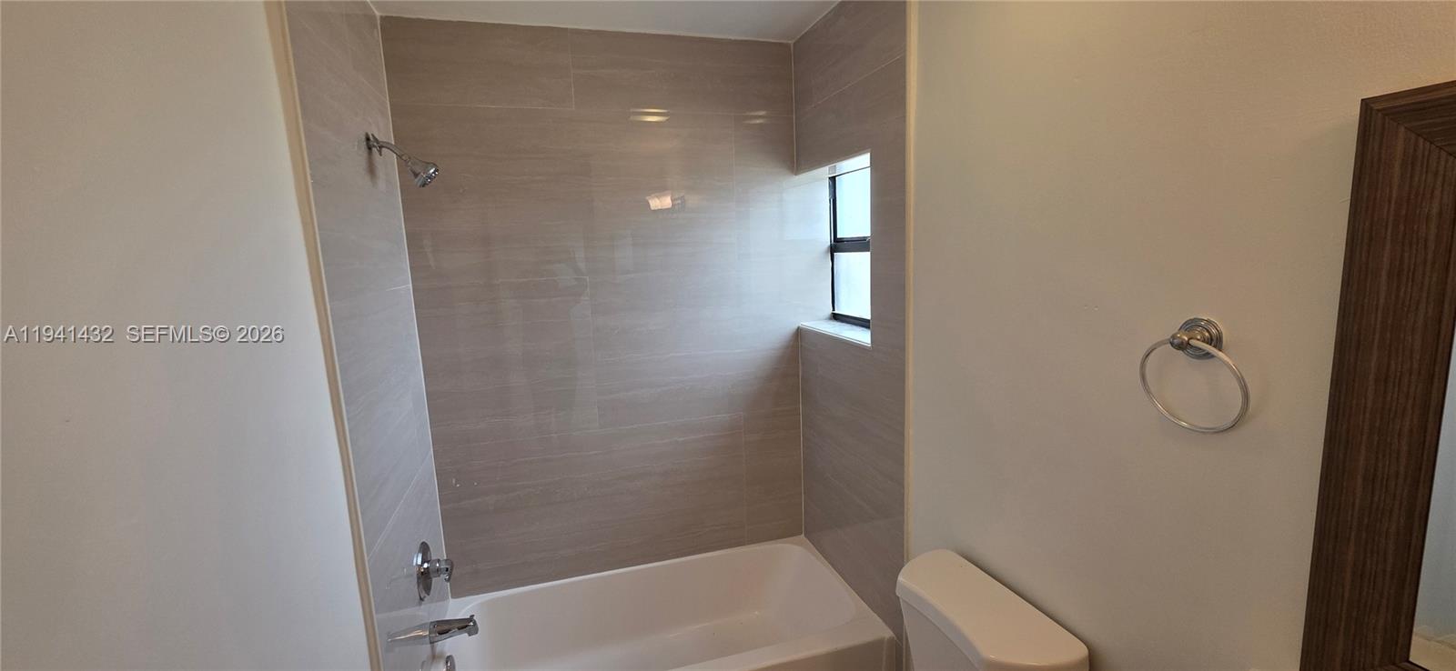 15238 Southwest 58th Terrace Miami, FL 33193 - Photo 33 of 46 a bathroom with a shower and toilet