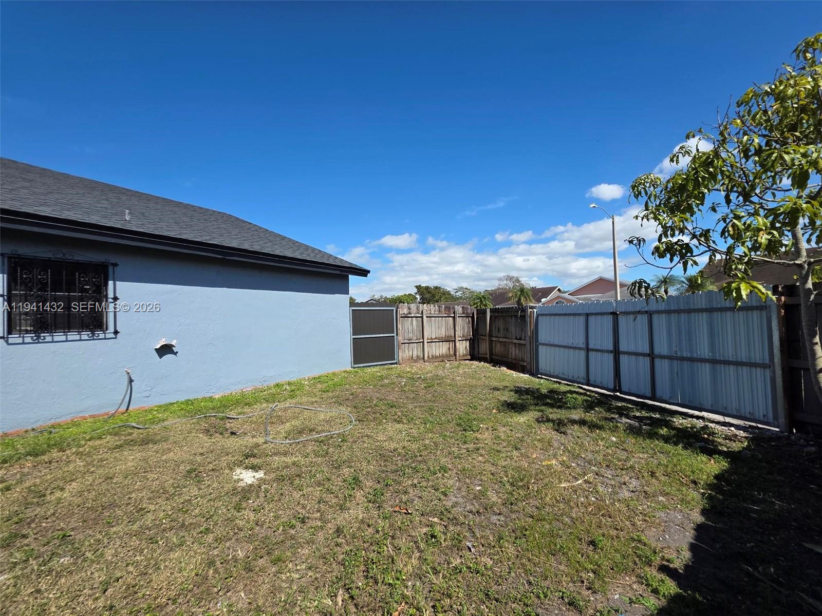 15238 Southwest 58th Terrace Miami, FL 33193 - Photo 34 of 38 a view of a backyard