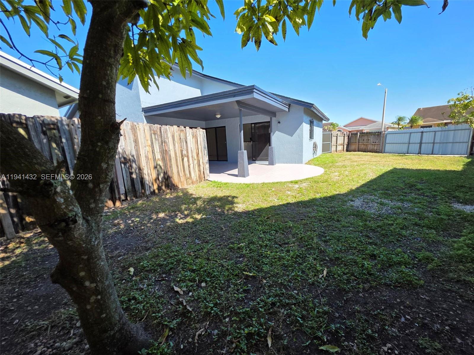 15238 Southwest 58th Terrace Miami, FL 33193 - Photo 35 of 38 a view of a house with a swimming pool