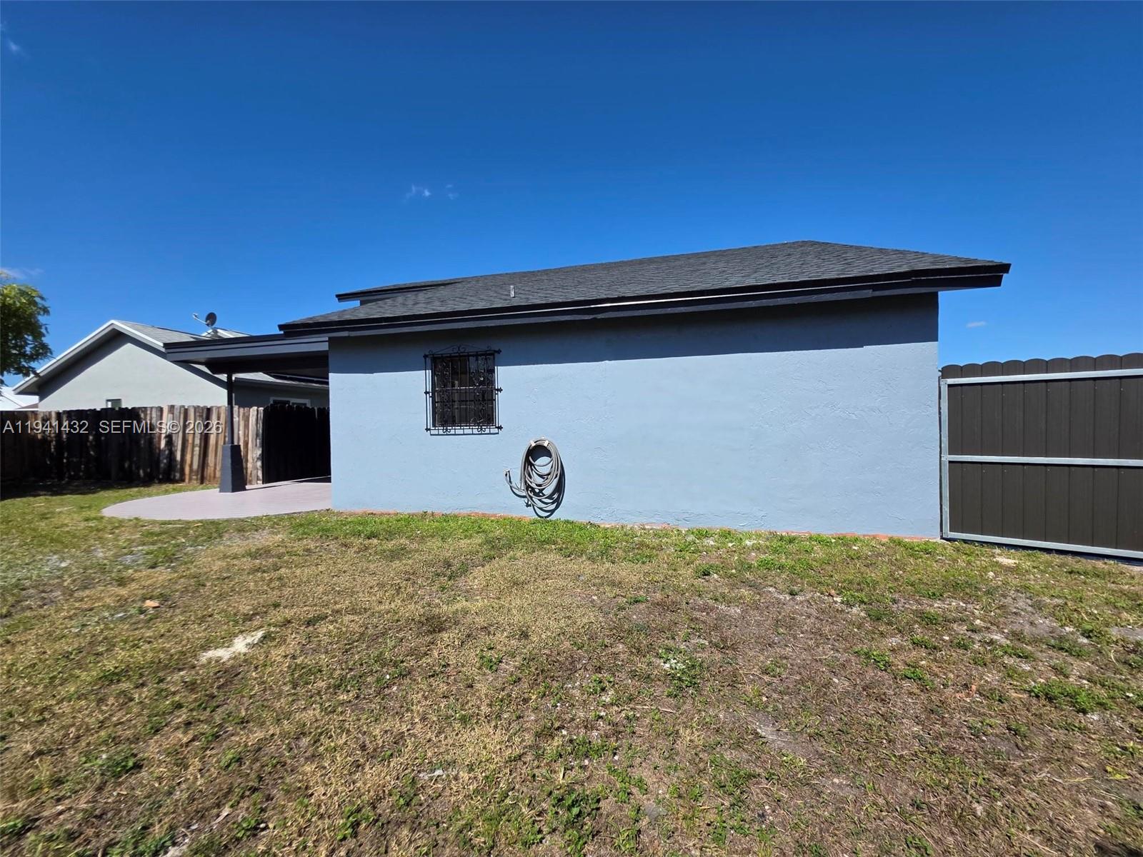 15238 Southwest 58th Terrace Miami, FL 33193 - Photo 38 of 38 a house view with a outdoor space