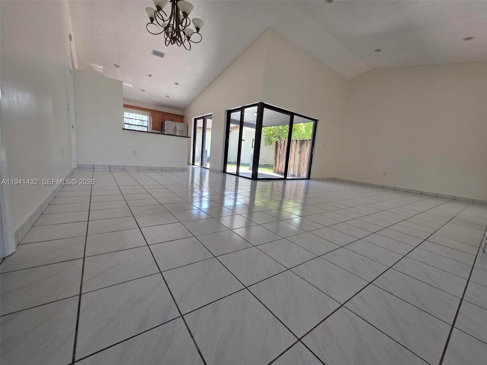 15238 Southwest 58th Terrace Miami, FL 33193 - Photo 8 of 38 an empty room with windows