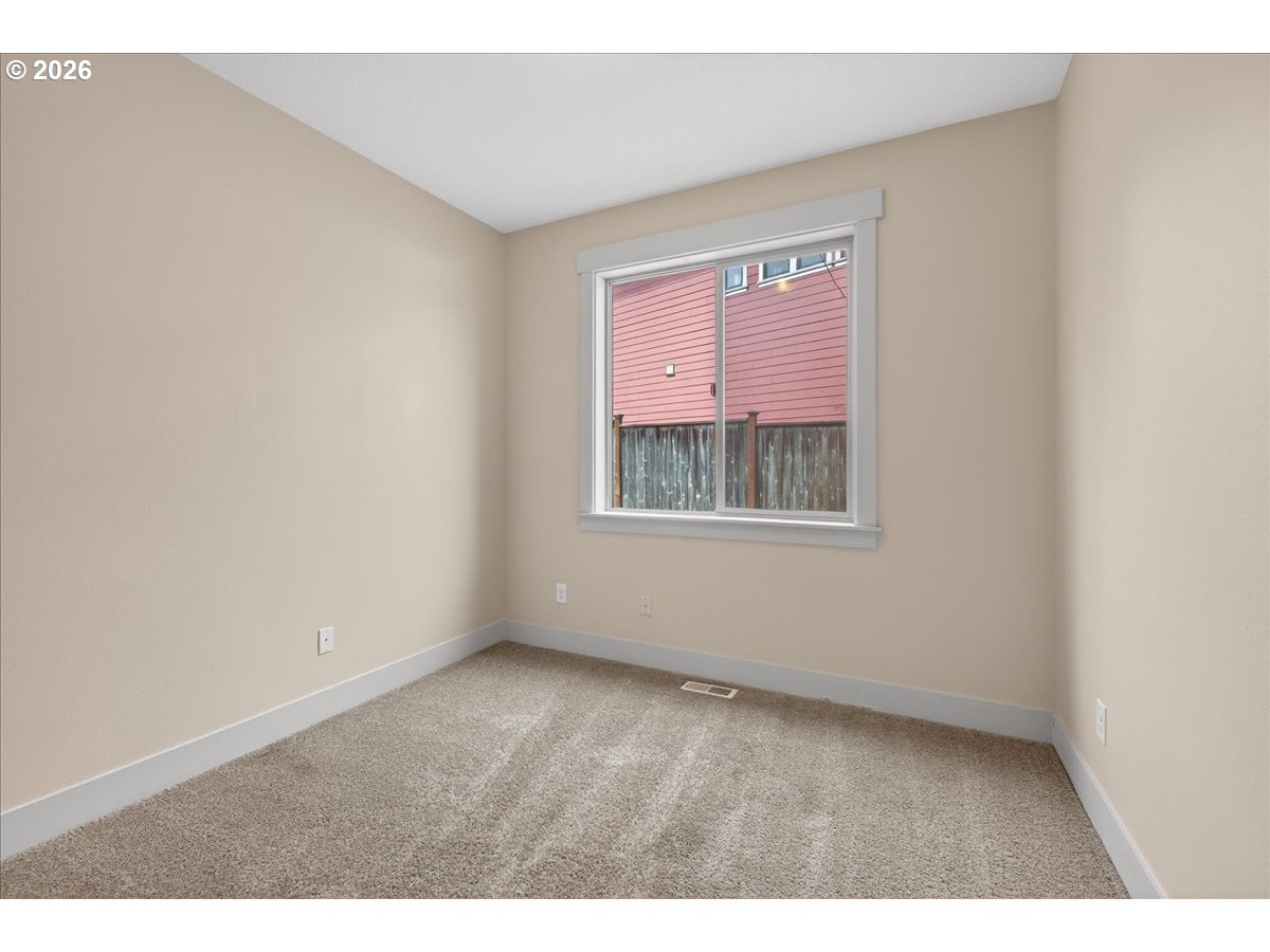 561 North Declaration Drive Carlton, OR 97111 - Photo 19 of 44 a view of an empty room with a window