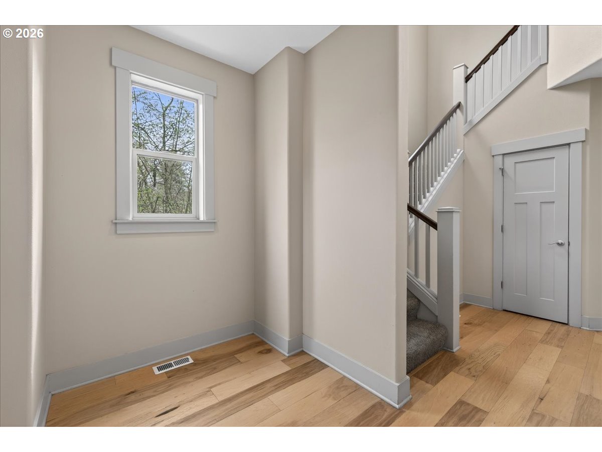 561 North Declaration Drive Carlton, OR 97111 - Photo 6 of 44 a view interior of a house with wooden floor and stairs