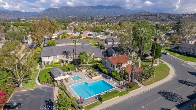 an aerial view of a house with a garden