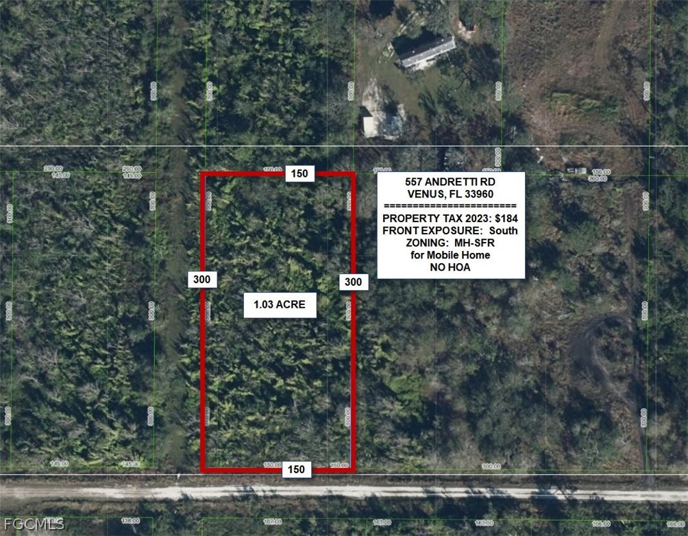 557 Andretti Road Venus, FL 33960 - Photo 1 of 2 a sign that is on the side of a road