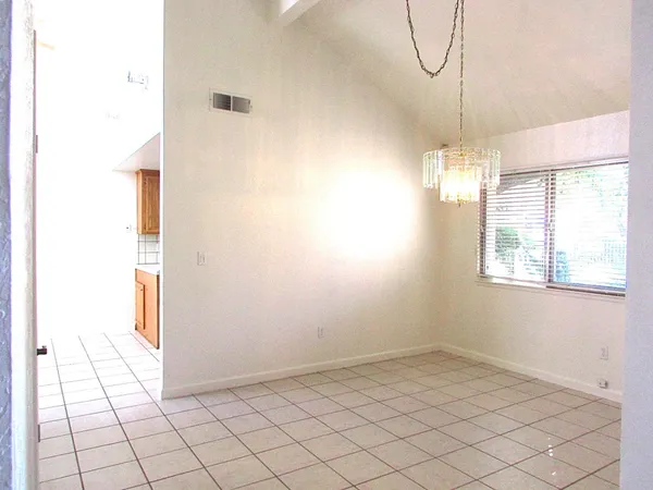 a view of entryway with chandelier
