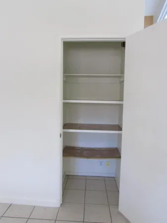 a bathroom with a glass shower door and a bathtub