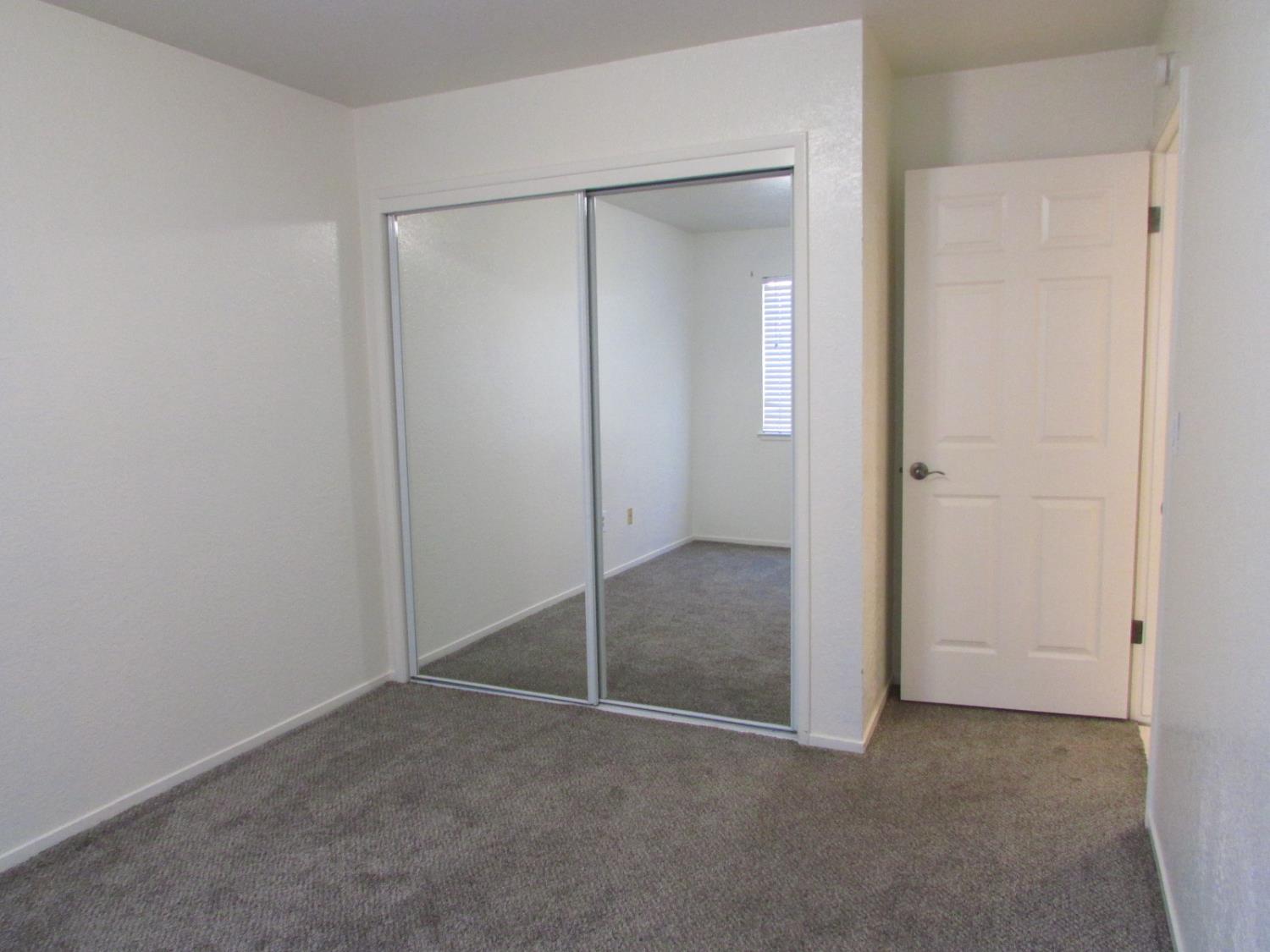1855 Scenic Drive, Unit F Modesto, CA 95355 - Photo 36 of 52 a view of an empty room
