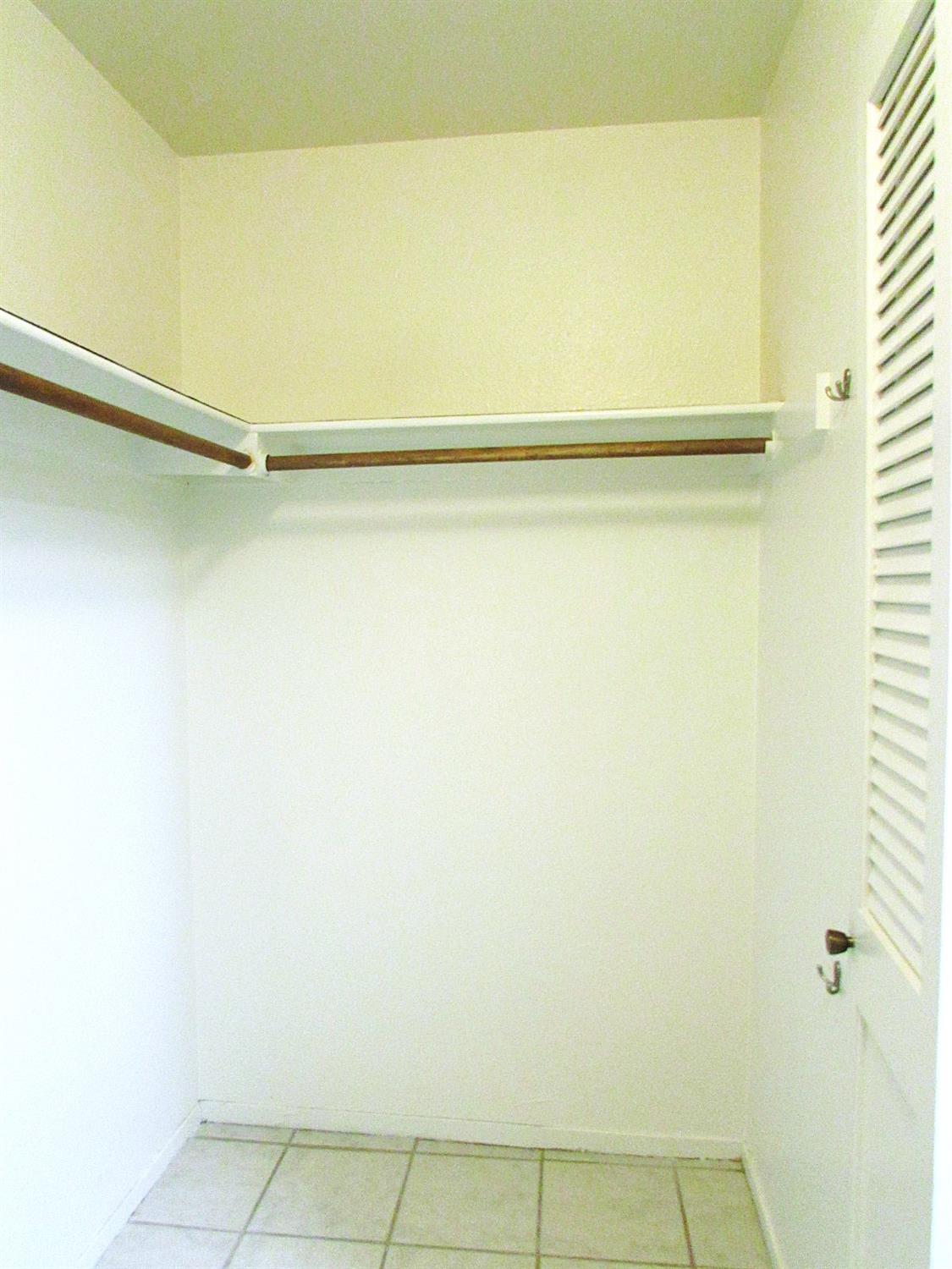 1855 Scenic Drive, Unit F Modesto, CA 95355 - Photo 44 of 52 a close up view of racks on the wall