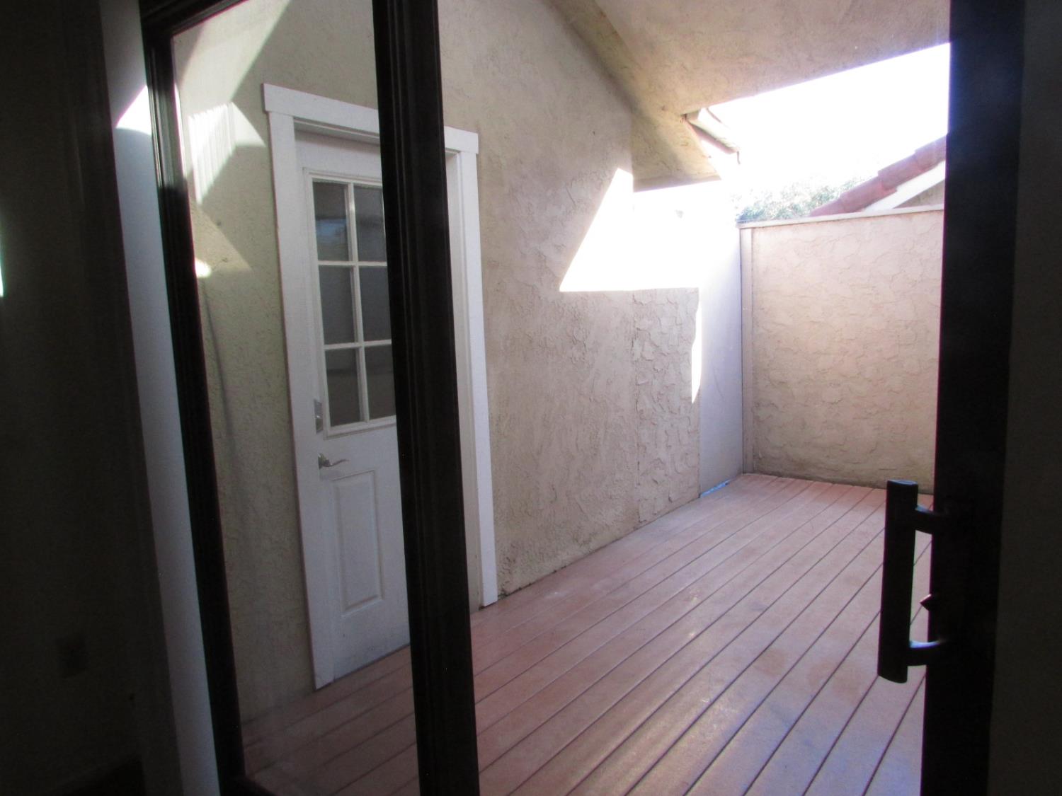 1855 Scenic Drive, Unit F Modesto, CA 95355 - Photo 52 of 52 a view of hallway with wooden floor