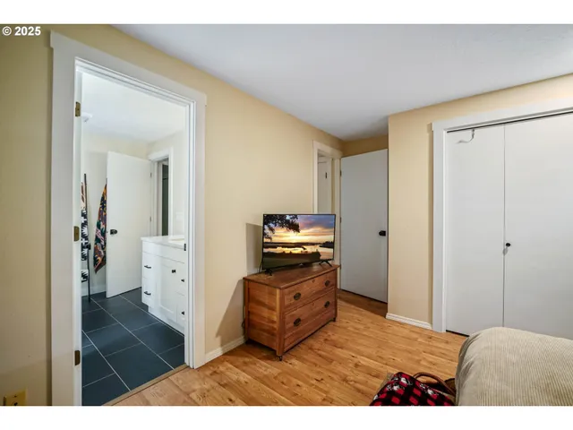 a view of a bedroom from a hallway