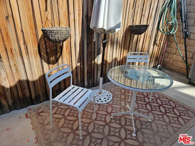 a utility room with cabinets washer and dryer