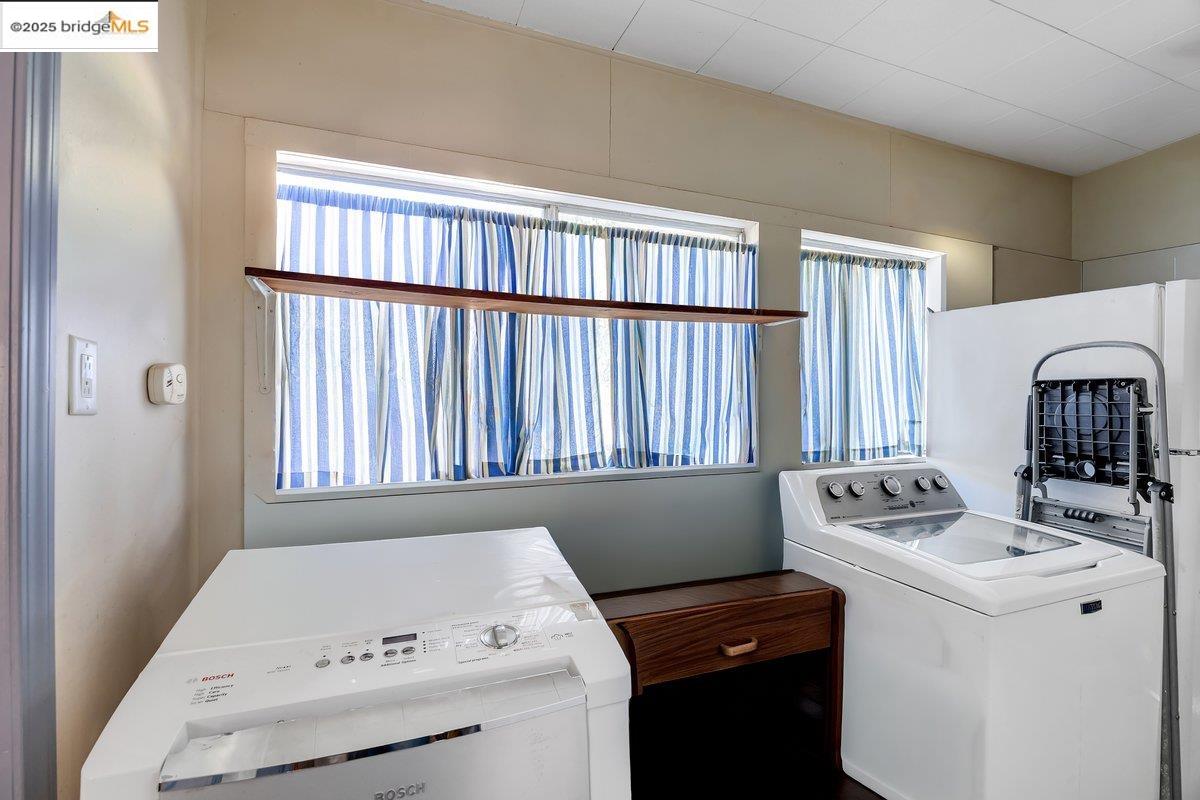 832 Shaws Flat Road Sonora, CA 95370 - Photo 14 of 22 a utility room with dryer and washer