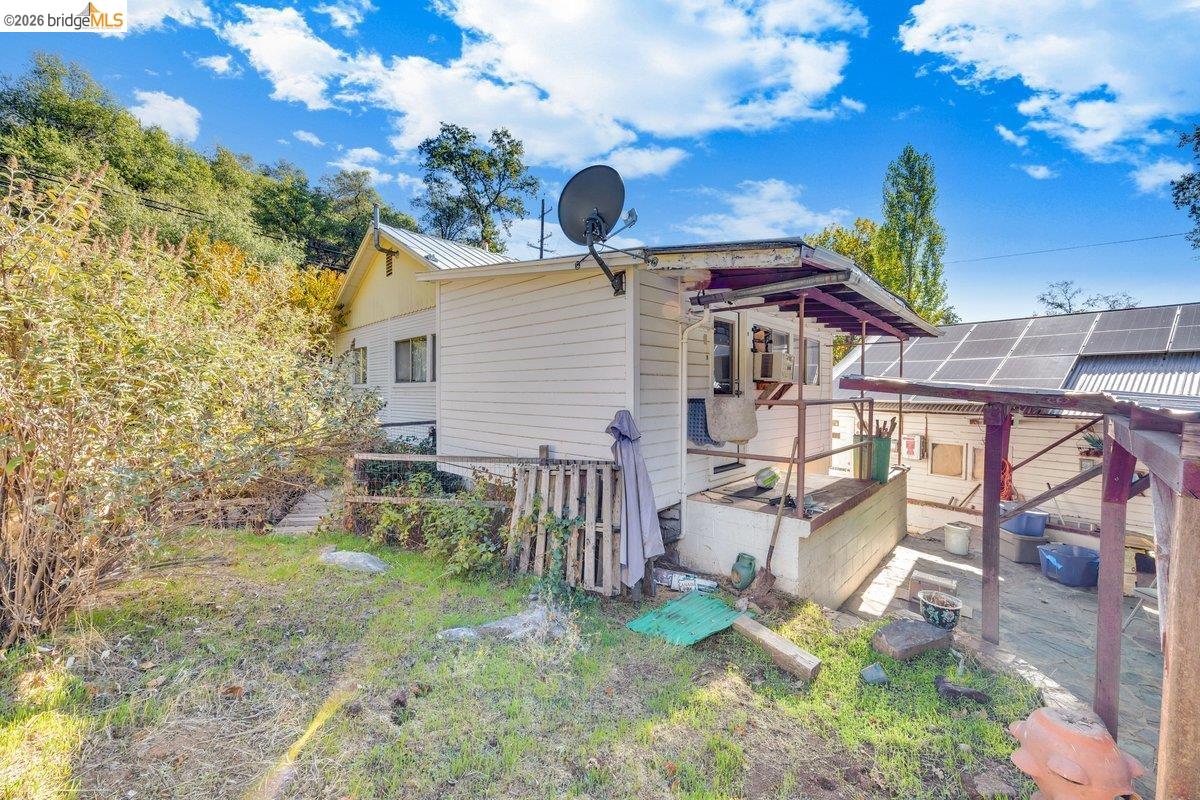 832 Shaws Flat Road Sonora, CA 95370 - Photo 16 of 25 a view of a house with a yard