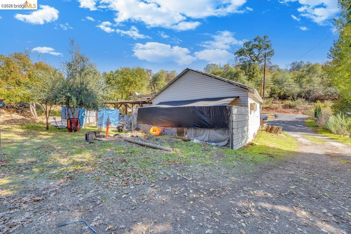 832 Shaws Flat Road Sonora, CA 95370 - Photo 17 of 25 a view of a yard with a house