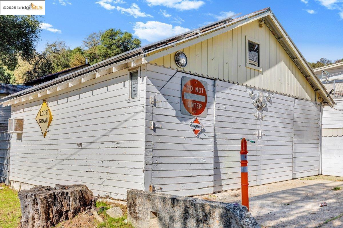 832 Shaws Flat Road Sonora, CA 95370 - Photo 21 of 22 a front view of a house with parking