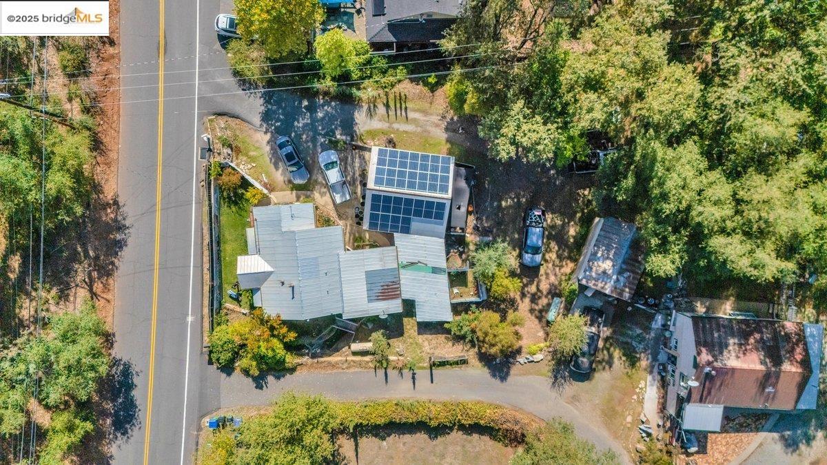 832 Shaws Flat Road Sonora, CA 95370 - Photo 5 of 22 an aerial view of a house with a yard and garden