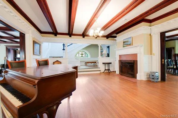 a view of kitchen with furniture and fireplace