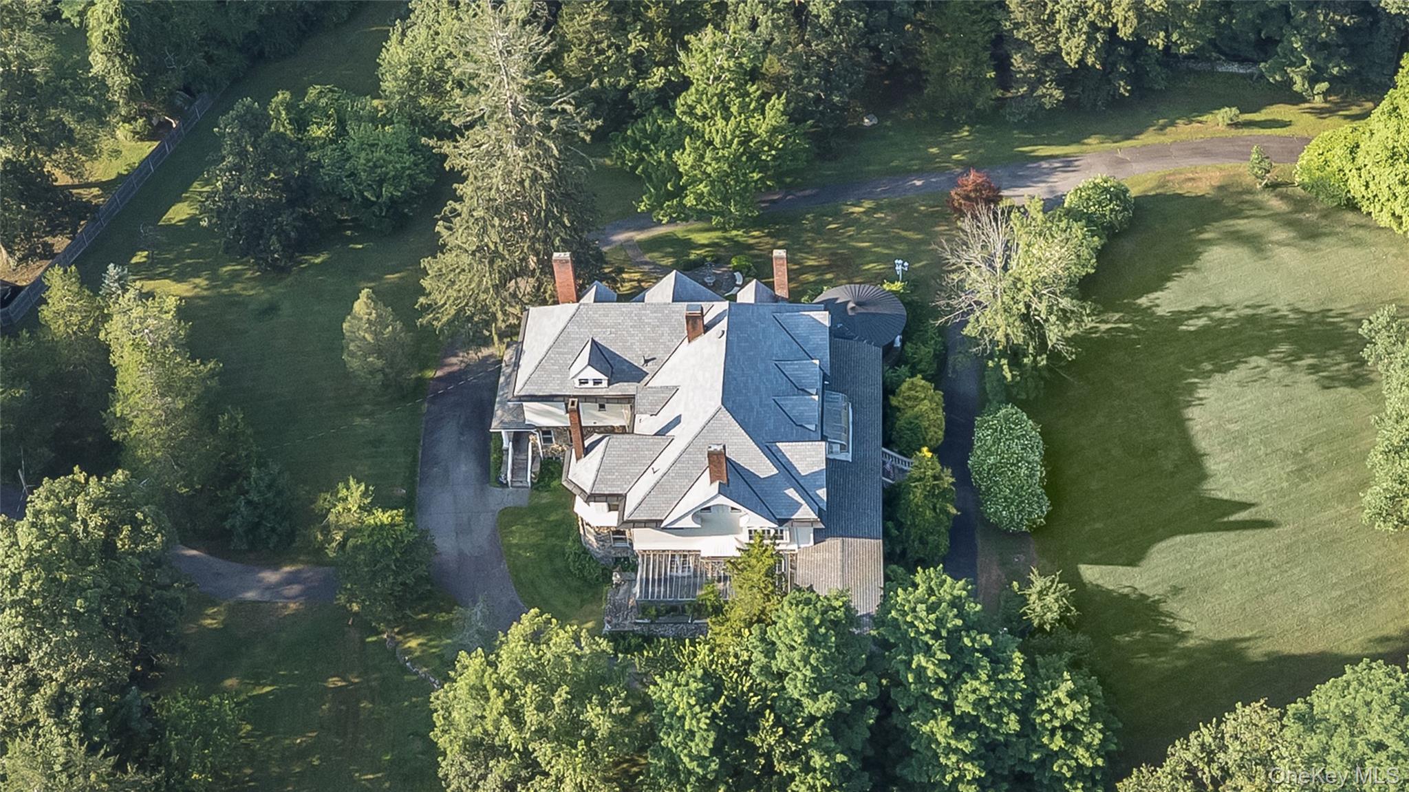 24 Jill Road Highland Mills, NY 10930 - Photo 32 of 43 an aerial view of a house with a yard basket ball court and outdoor seating