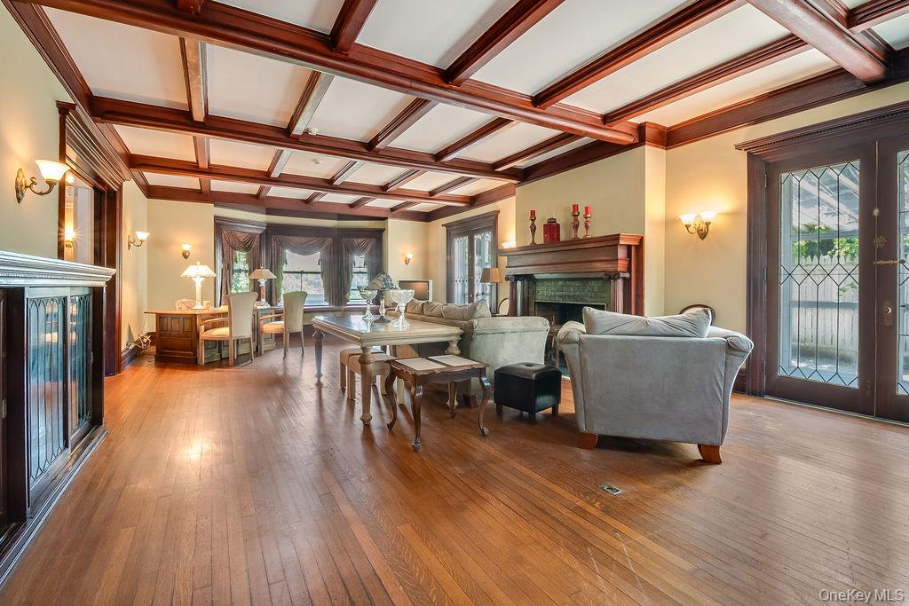 24 Jill Road Highland Mills, NY 10930 - Photo 9 of 43 a living room with furniture wooden floor and a fireplace