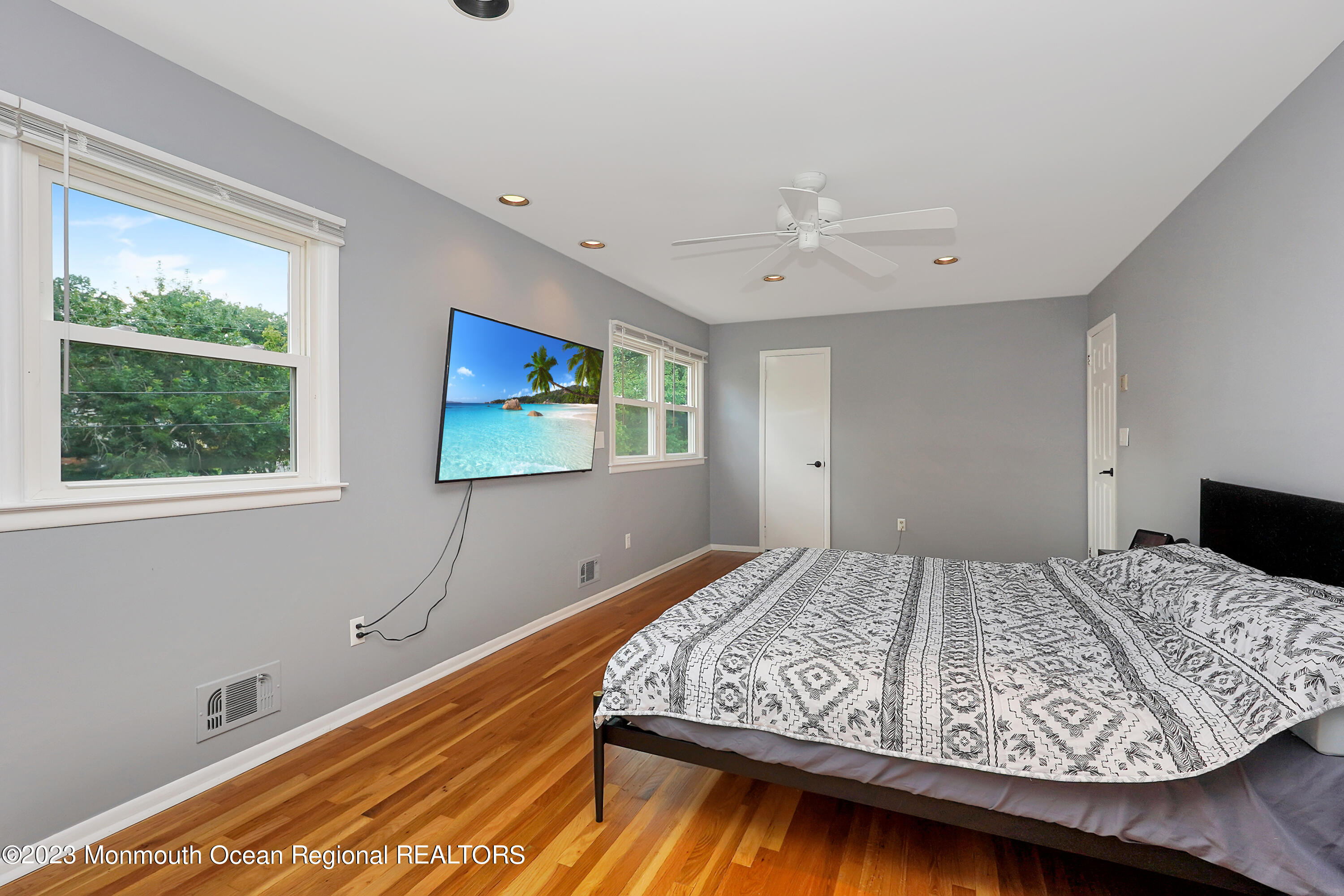 37 Prince William Road Morganville, NJ 07751 - Photo 19 of 35 a bedroom with a bed and window