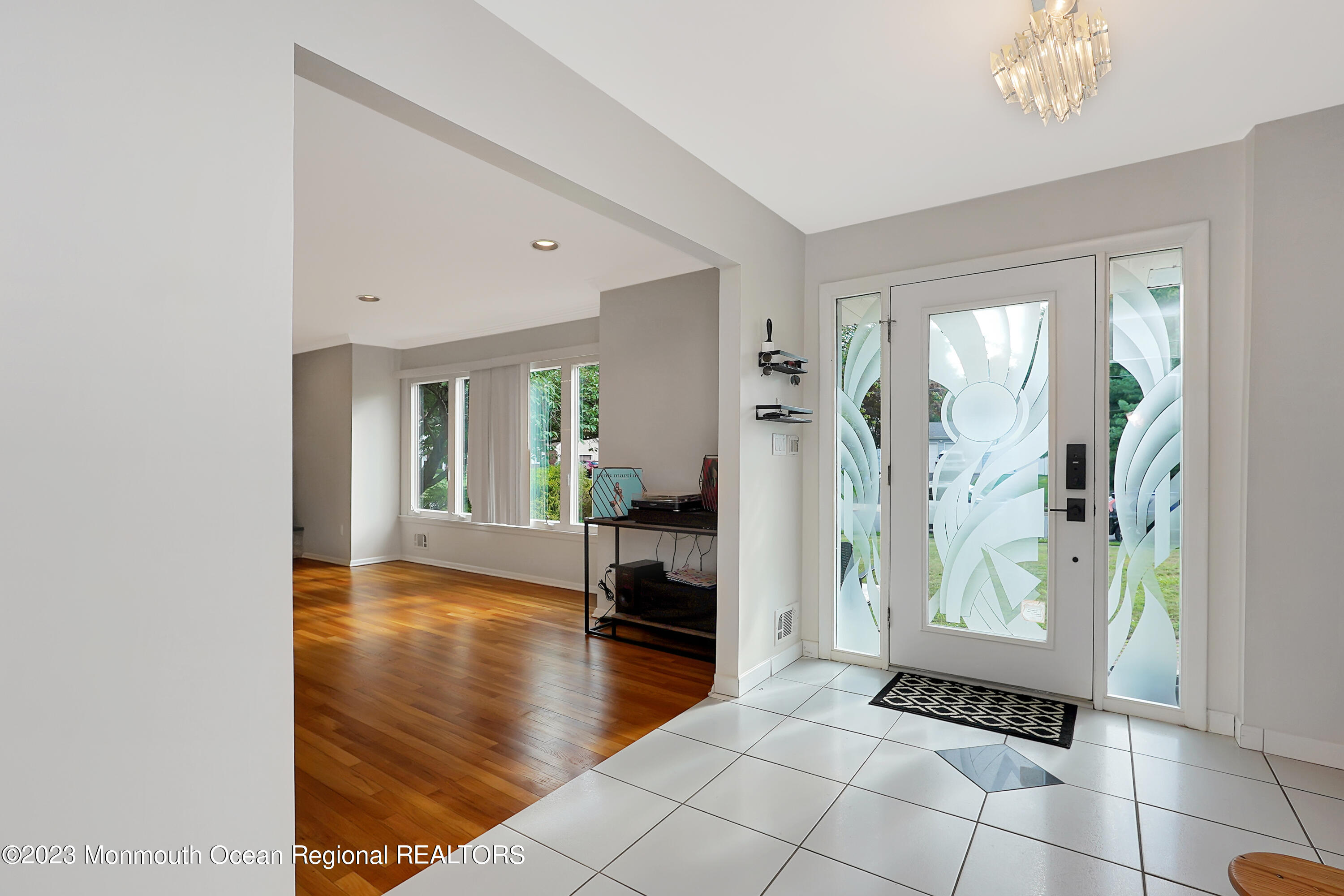 37 Prince William Road Morganville, NJ 07751 - Photo 4 of 35 a view of an entryway with wooden floor