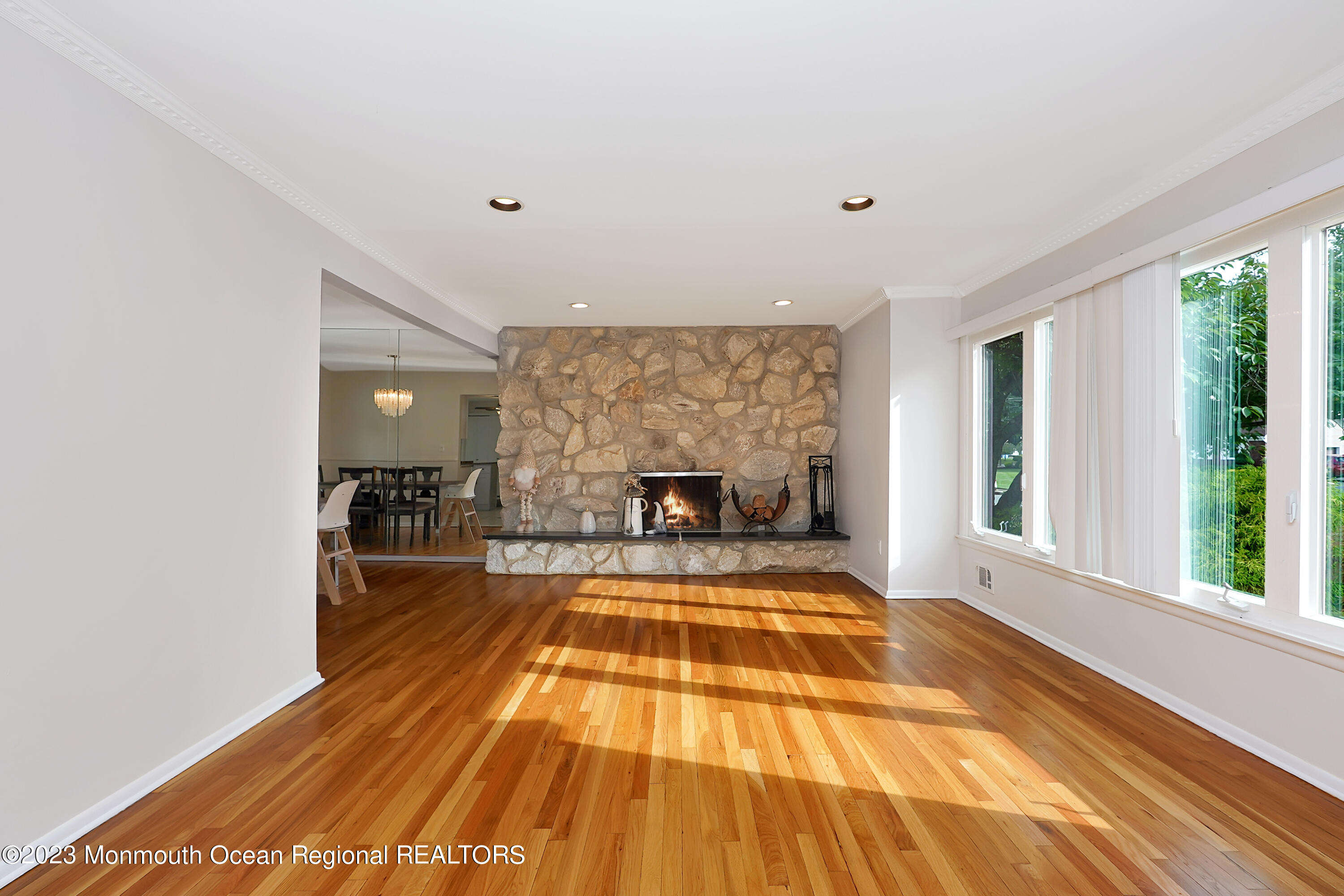 37 Prince William Road Morganville, NJ 07751 - Photo 8 of 35 a view of a swimming pool and lounge chair