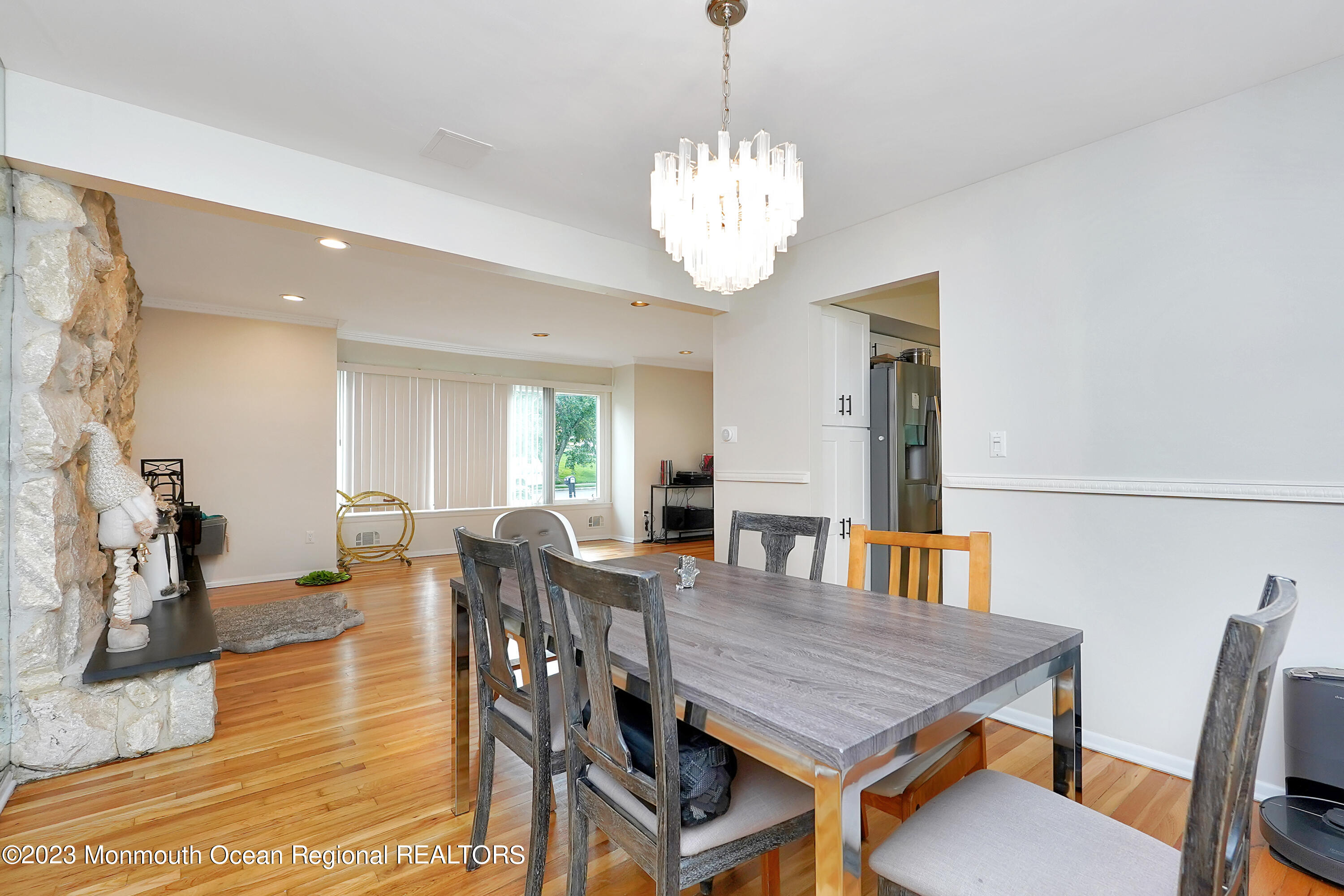 37 Prince William Road Morganville, NJ 07751 - Photo 10 of 35 a view of a dining room with furniture