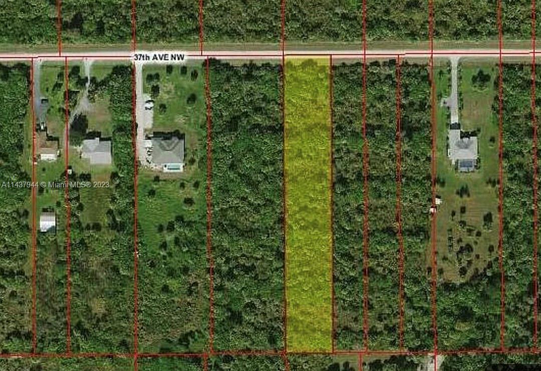 490 37th Avenue Northwest Naples, FL 34120 - Photo 4 of 16 a view of a fence