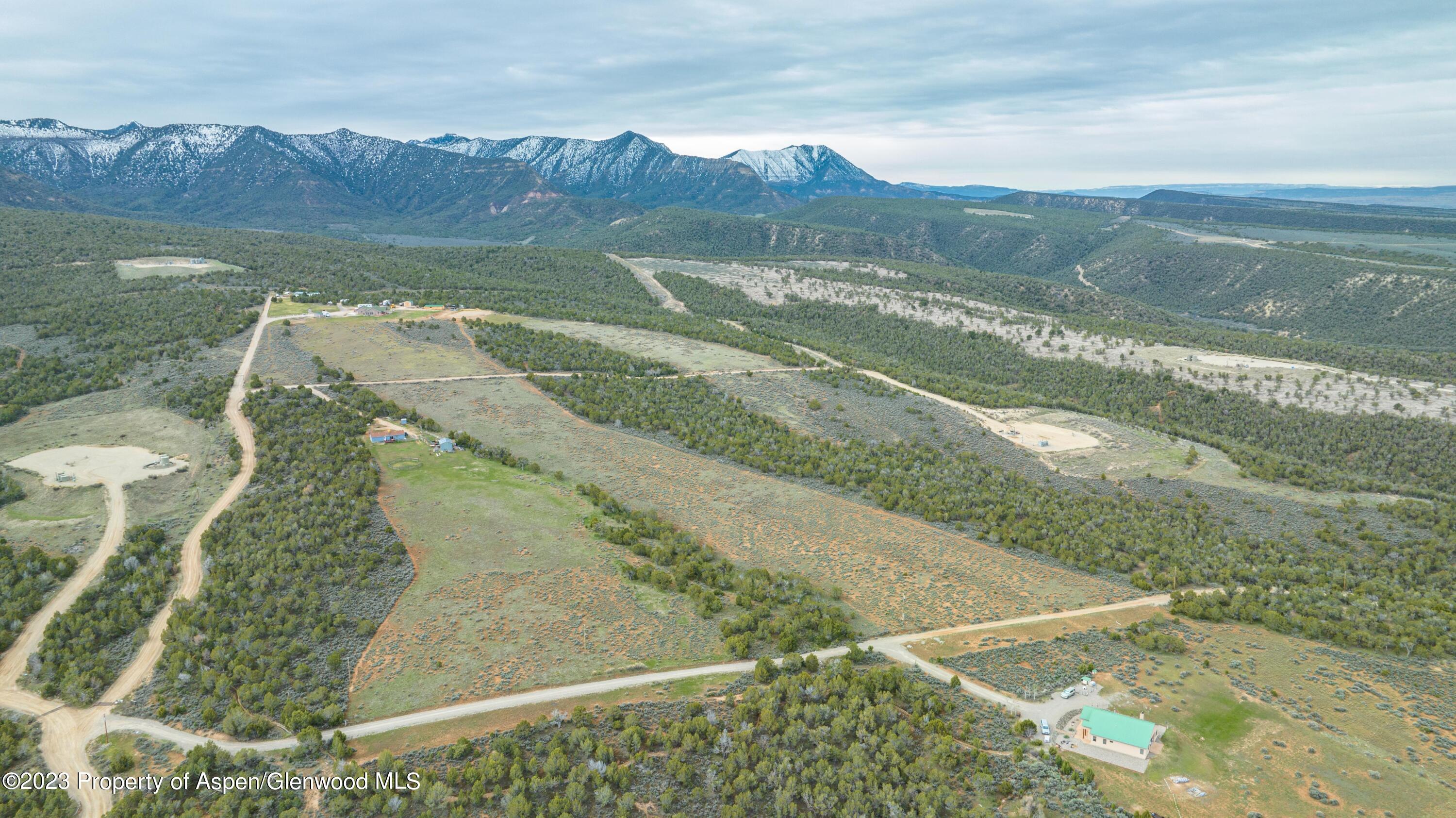 2345 County Road 306 Parachute, CO 81635 - Photo 15 of 29 a view of a lake with a mountain