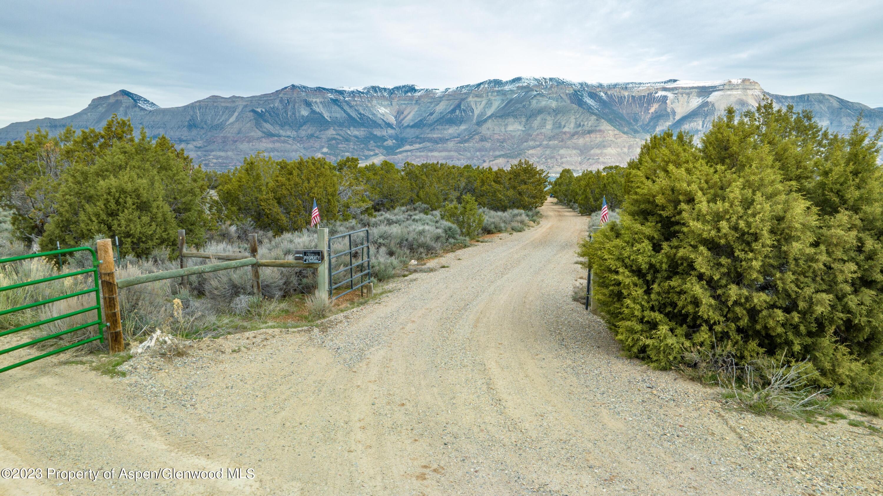 2345 County Road 306 Parachute, CO 81635 - Photo 16 of 29 a view of a street with a mountain view