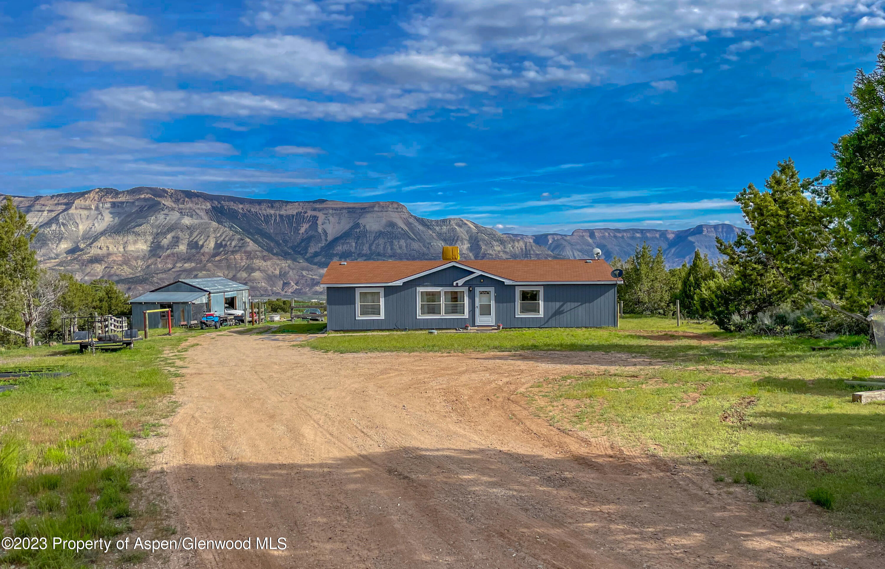 2345 County Road 306 Parachute, CO 81635 - Photo 17 of 29 a view of a house with a big yard