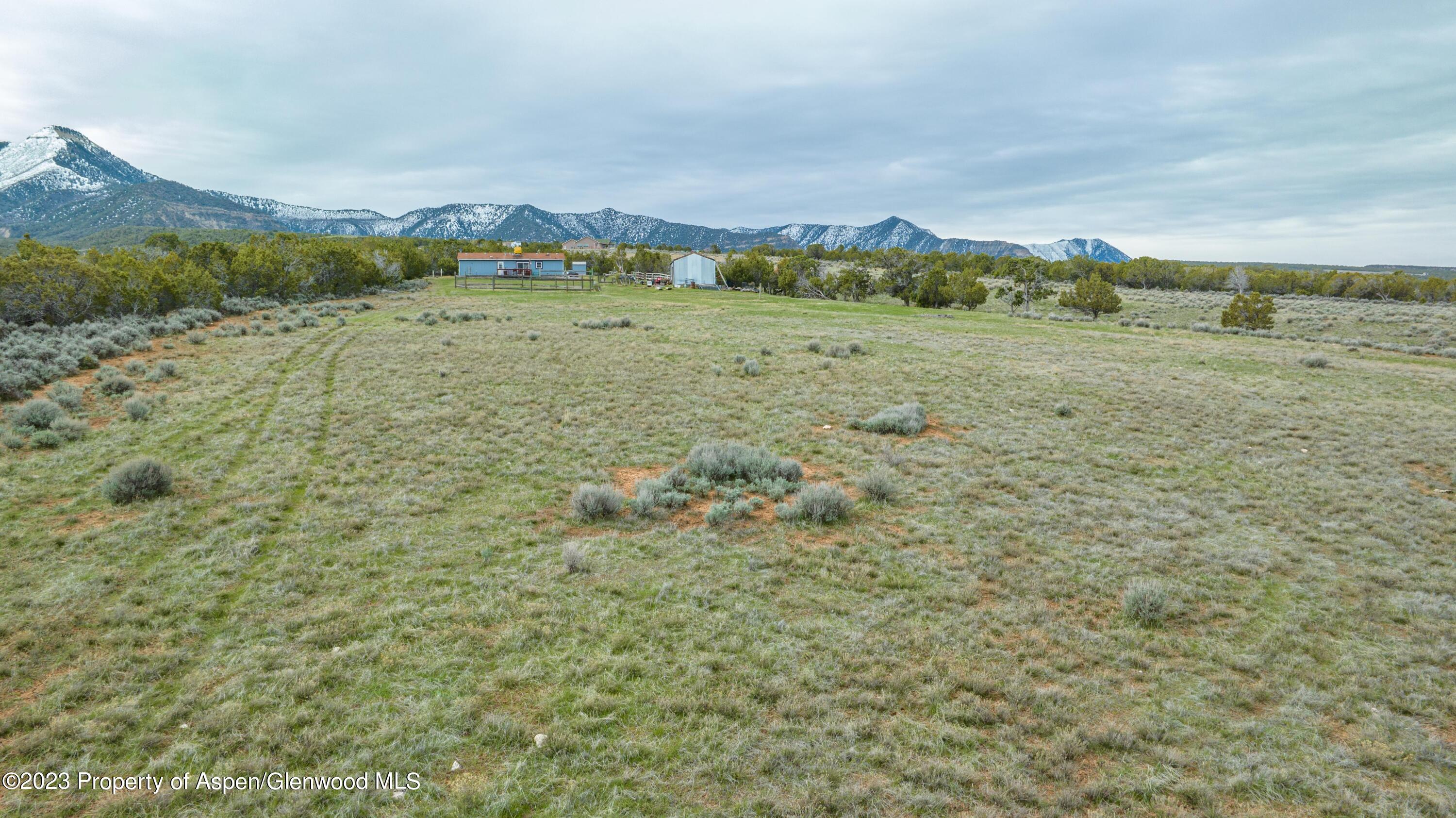 2345 County Road 306 Parachute, CO 81635 - Photo 18 of 29 a view of a field with an ocean