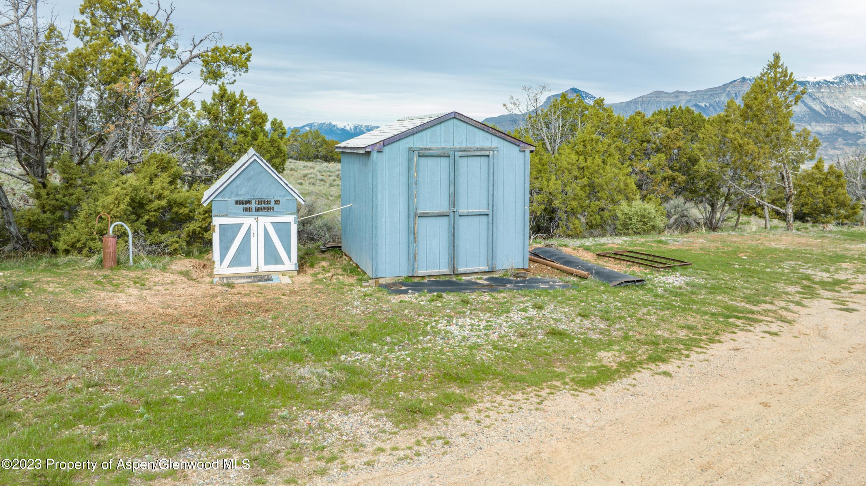 2345 County Road 306 Parachute, CO 81635 - Photo 19 of 29 a view of a house with a yard