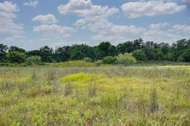a view of a lake and mountain in the back