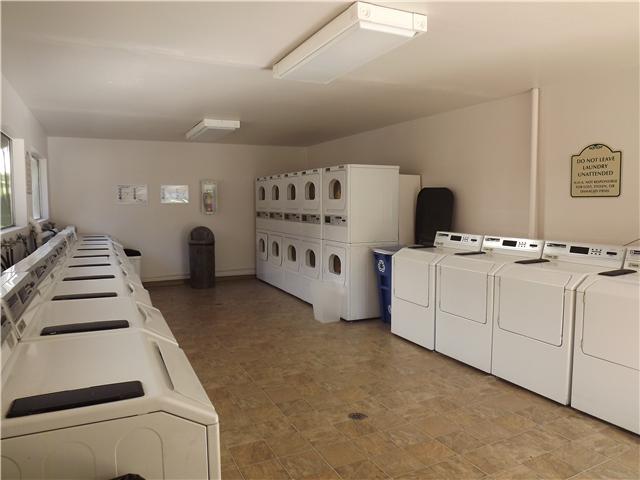 6171 Rancho Mission Road, Unit 205 San Diego, CA 92108 - Photo 9 of 9 Laundry area is clean, has lots of machines and is close to the condo.