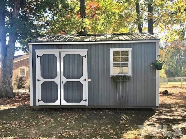 a wooden door in front of a house