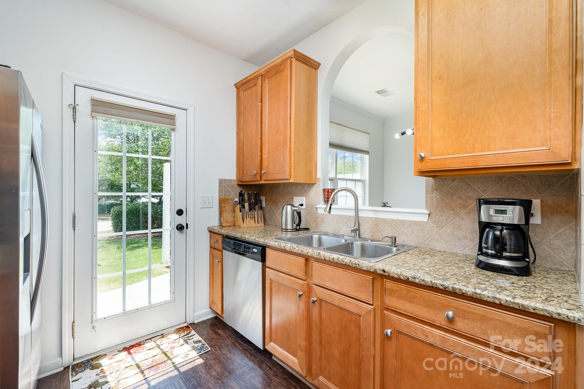 1912 Travertine Lane Fort Mill, SC 29708 - Photo 6 of 25 a kitchen with sink a window and cabinets