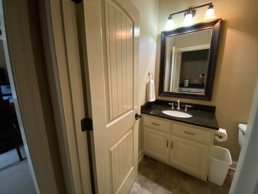 295 North Ridge Drive Saltillo, MS 38866 - Photo 31 of 38 a bathroom with a double vanity sink and a mirror