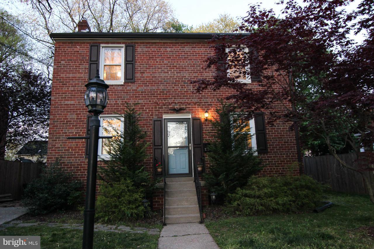 9129 Eton Road Silver Spring, MD 20901 - Photo 3 of 29 a front view of a house with a garden