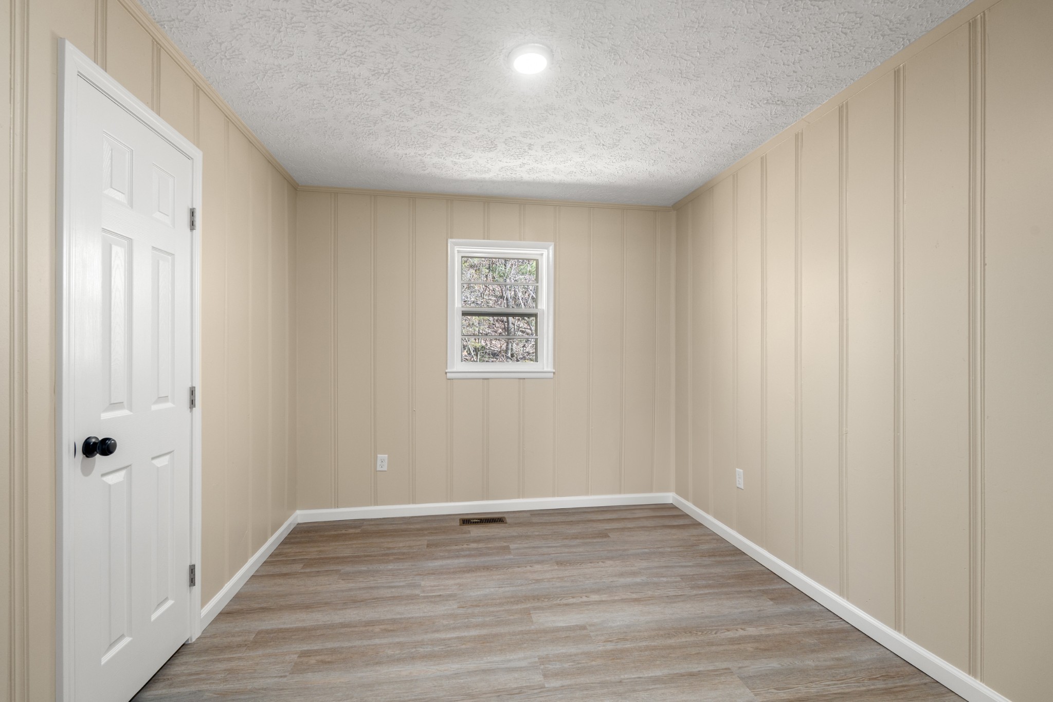351 Highway 100 Centerville, TN 37033 - Photo 17 of 31 a view of an empty room with wooden floor