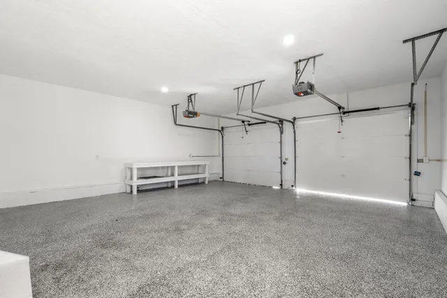 a view of a room with stairs and furniture