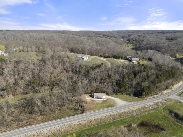 a view of a yard with an outdoor space and seating area