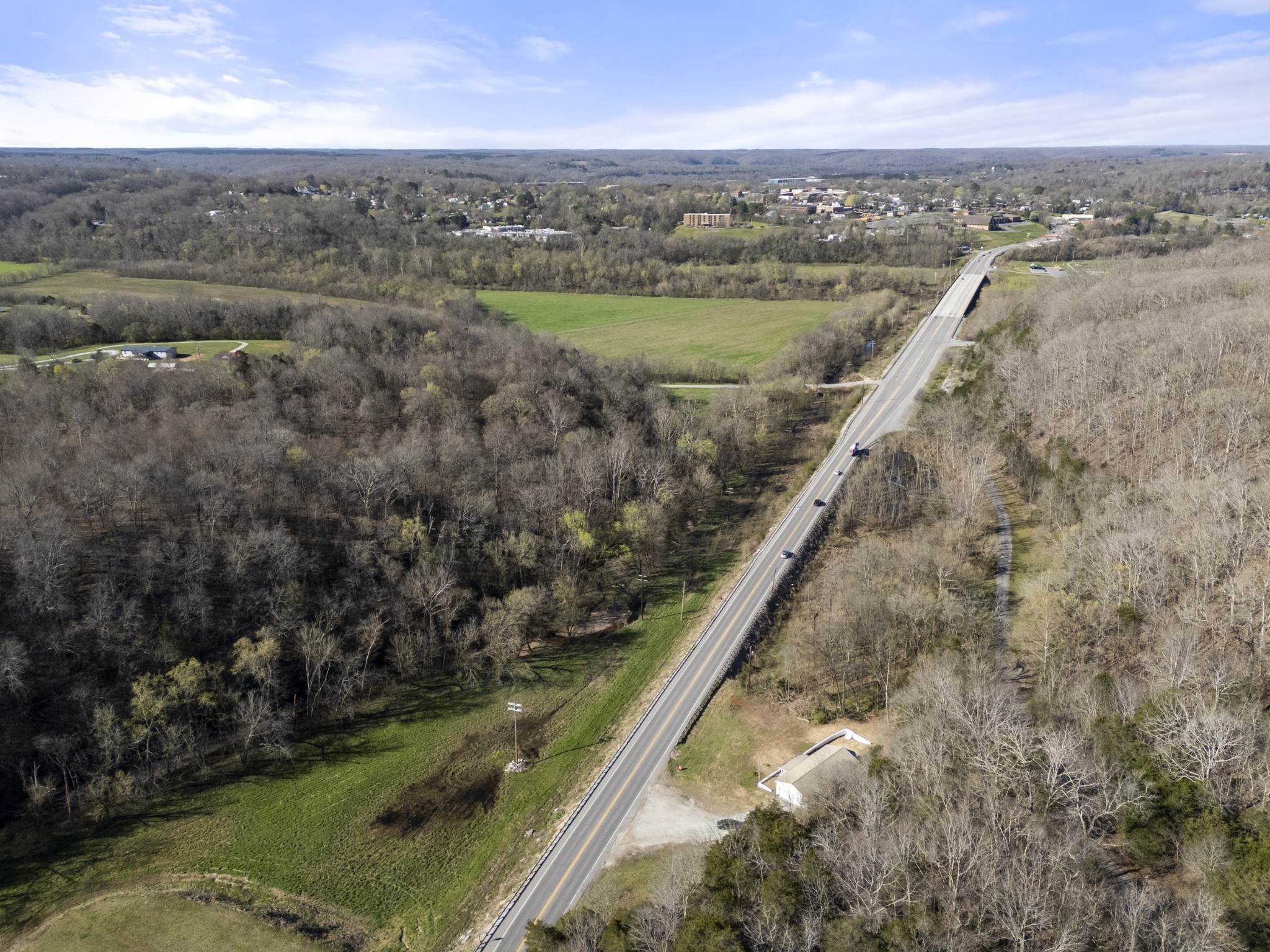 351 Highway 100 Centerville, TN 37033 - Photo 26 of 31 a view of a lake with a city