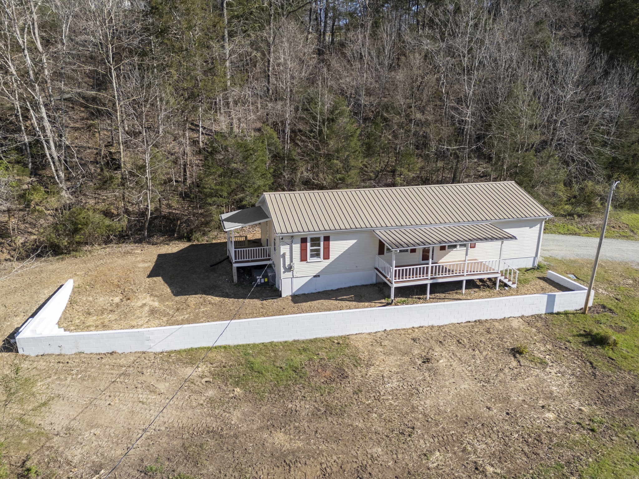 351 Highway 100 Centerville, TN 37033 - Photo 28 of 31 a view of a house with backyard and sitting area