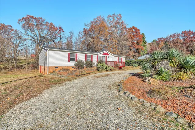a view of house with outdoor space and street view