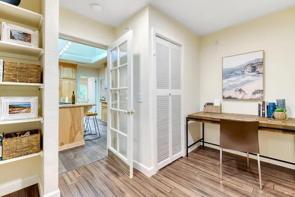 a spacious bathroom with a tub sink shower and mirror