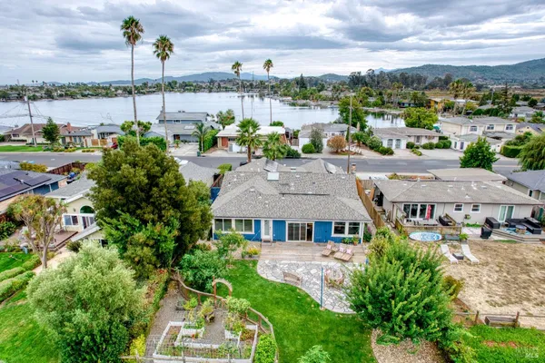 a view of a lake in front of house